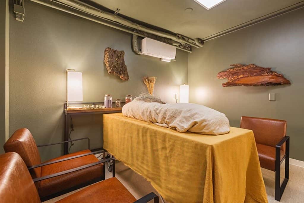 shrouded mannequin on table