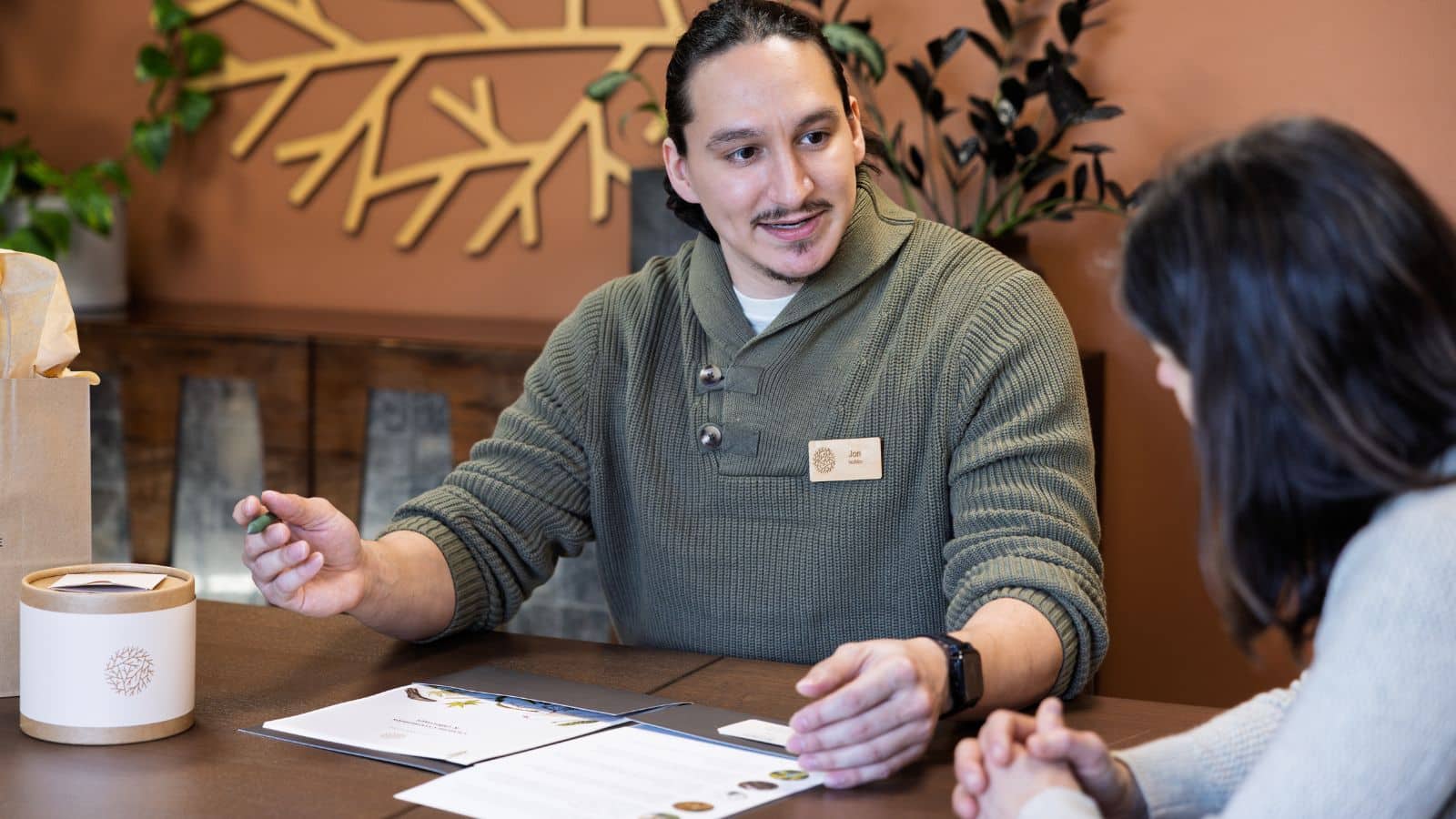 Jon with client discussing human composting