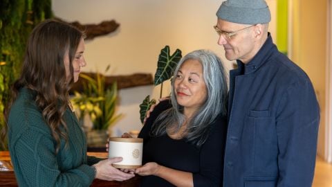 two people talking to a funeral home specialist