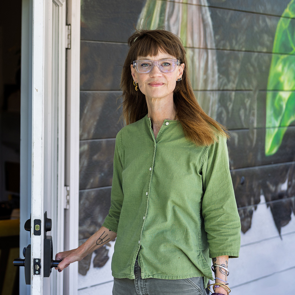 person holding door open