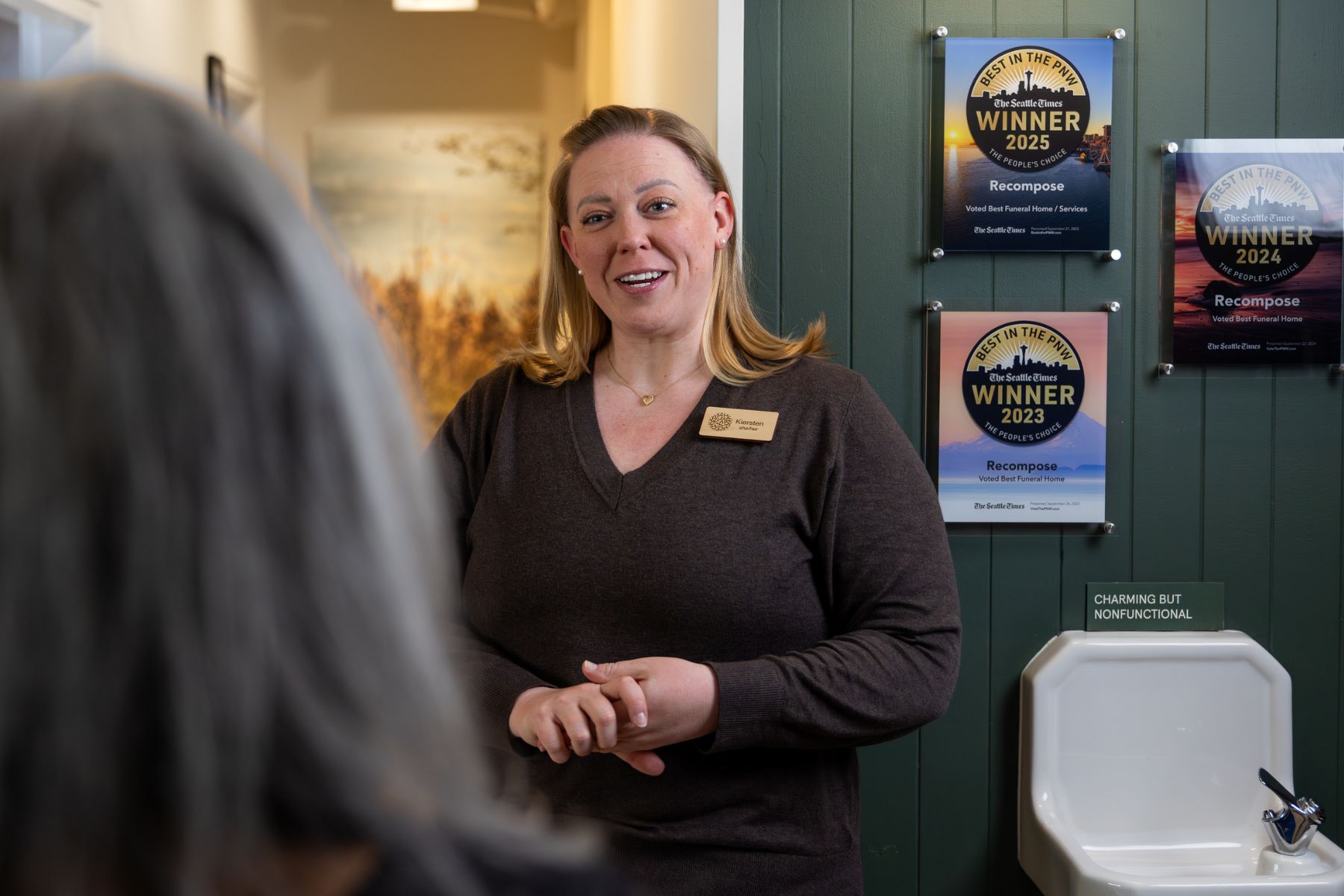 staff at funeral home talking with clients
